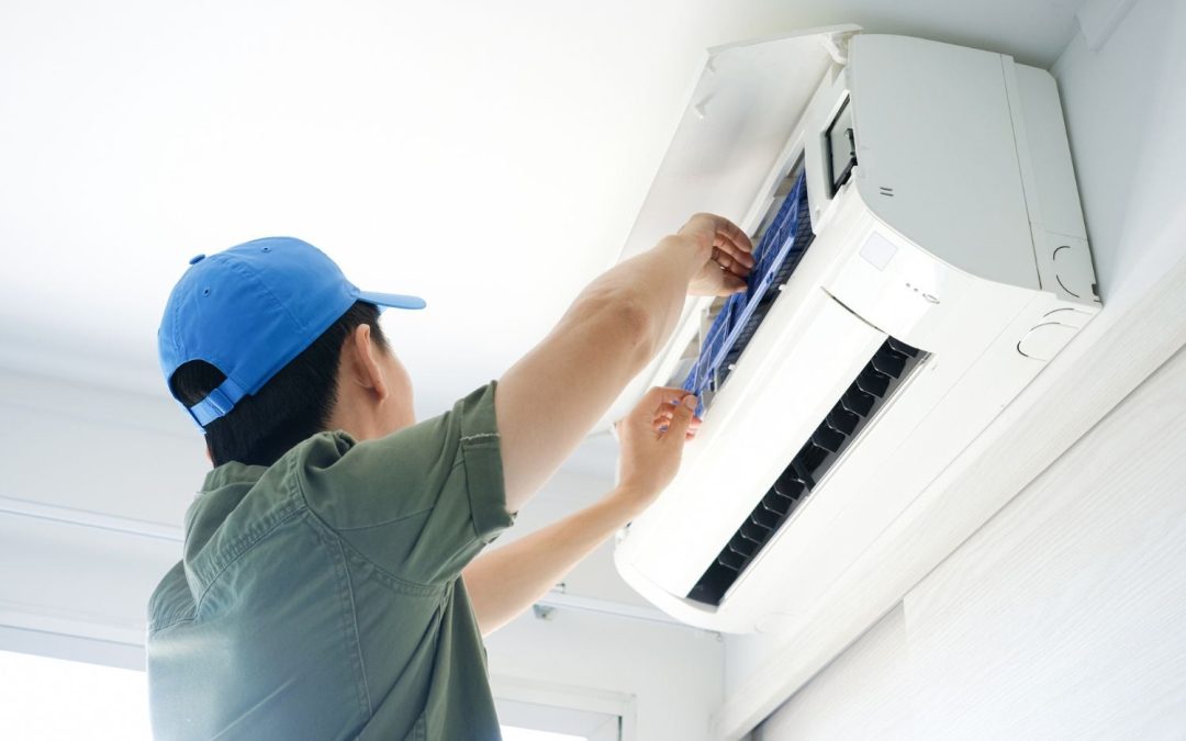 HVAC technician servicing a ductless mini split in Dublin
